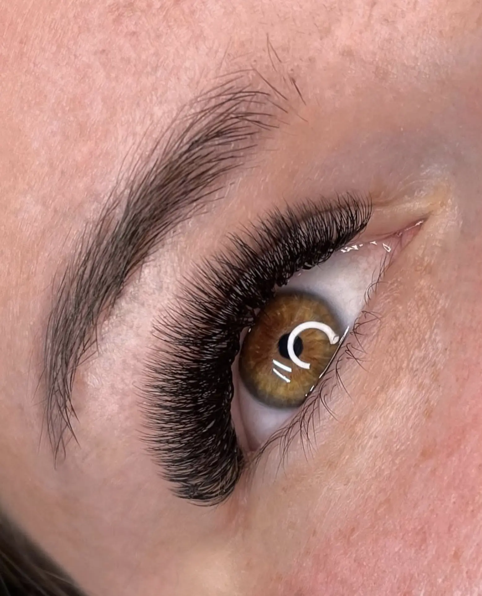 How long after eyelash extensions can I shower?
